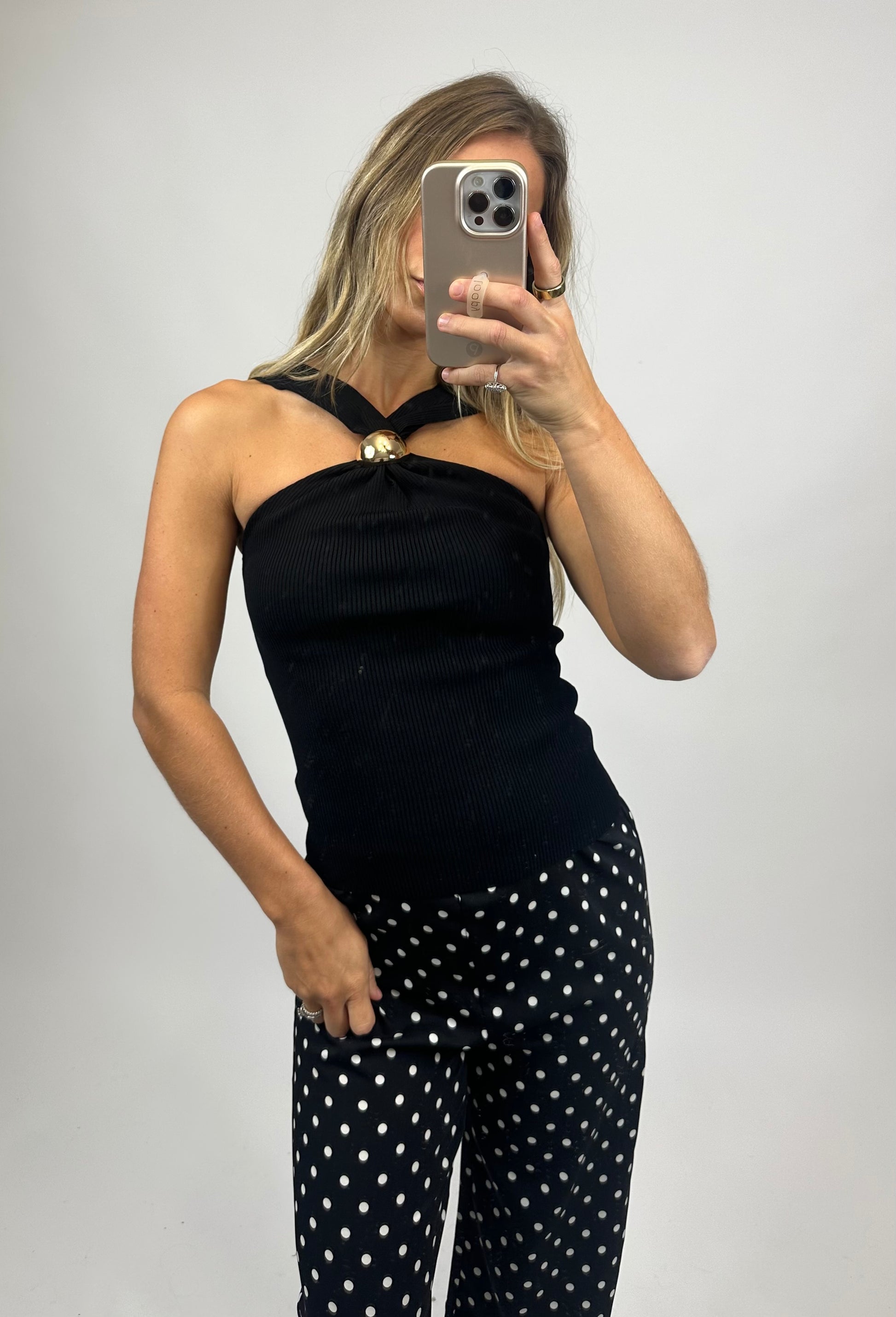 women's black halter top with black and white polka dot pants